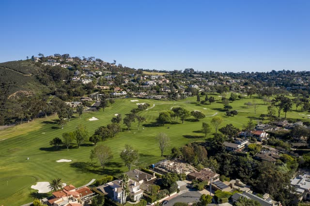 Aerial view of a residential street, palm trees and homes in Downtown San Diego.