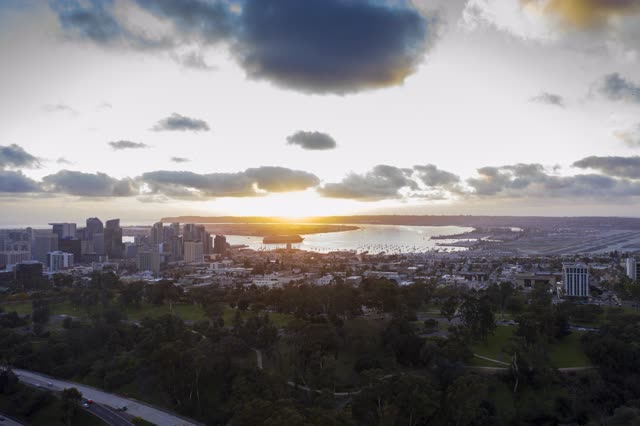 Aerial view of the downtown streets, the skyline and boats in Balboa Park.