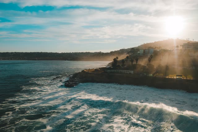 Sunrise over the waves at La Jolla Cove | Drone Photo – 2