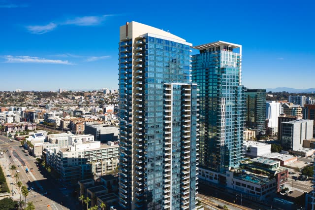 Aerial view of the downtown streets, the skyline and palm trees at Waterfront.