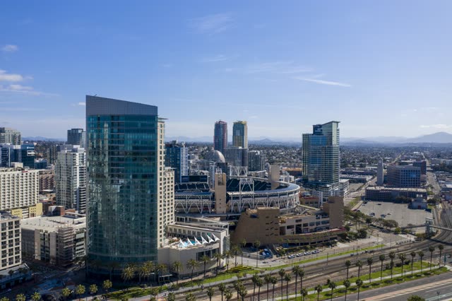 Aerial view of the downtown streets, the skyline and palm trees in Downtown San Diego.