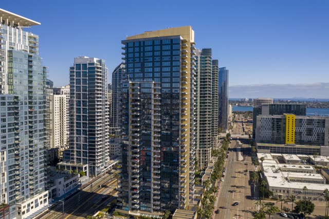 Aerial view of the downtown streets, the skyline and palm trees at Waterfront.