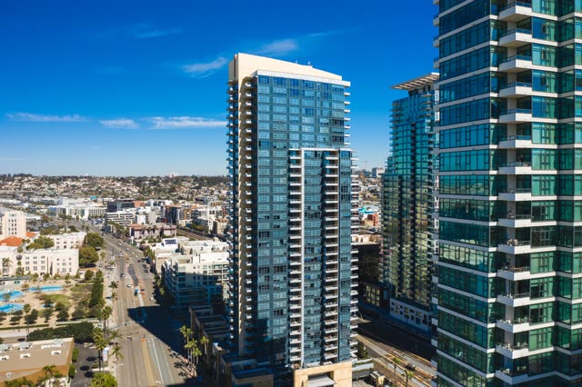 Aerial view of the downtown streets, the skyline and palm trees at Waterfront.