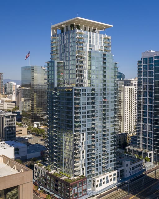Low aerial view of the downtown streets, the skyline and the buildings at Waterfront.