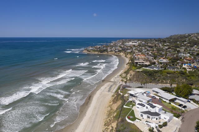Aerial view of the beach, the surf and the ocean in Pacific Beach.