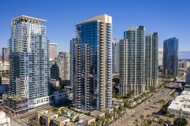 Aerial view of the downtown streets, the skyline and palm trees at Waterfront.