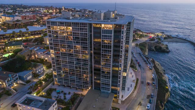 Aerial view of the downtown streets, the ocean and homes at La Jolla Cove.
