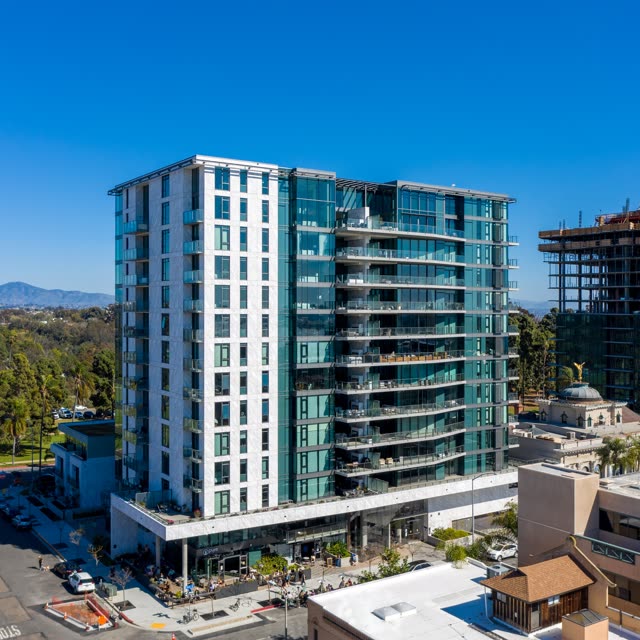 Low aerial view of the downtown streets, homes and the buildings at Bankers Hill.