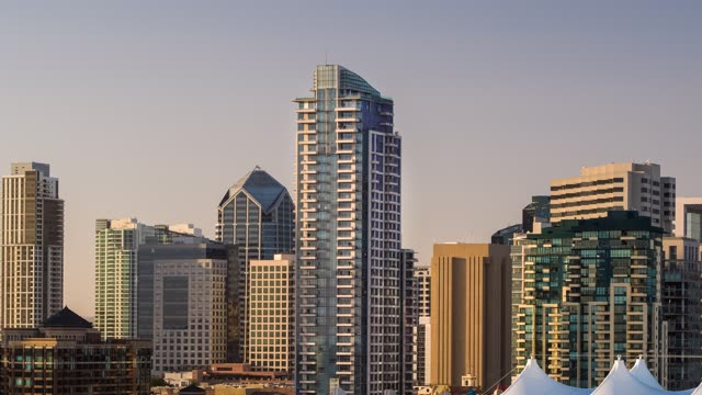Low aerial view of the downtown streets, the skyline and the buildings at Embarcadero.