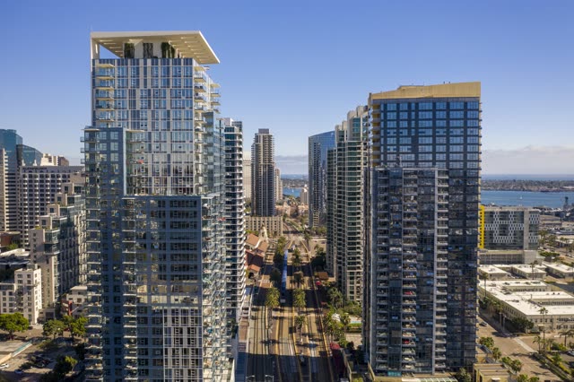 Aerial view of the downtown streets, the skyline and palm trees at Waterfront.