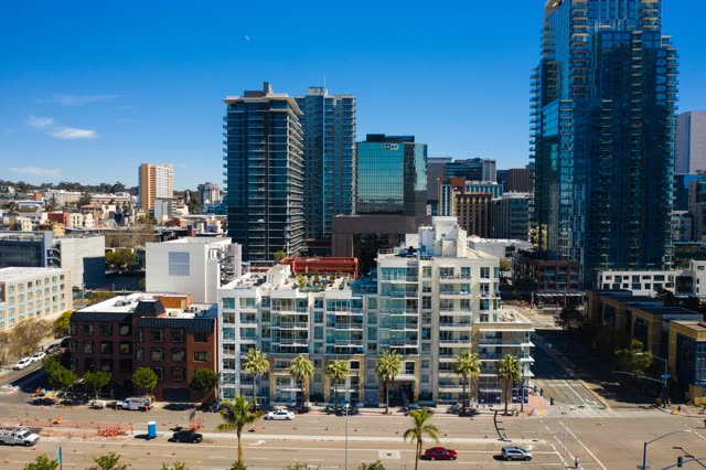 Aerial view of the downtown streets, the skyline and palm trees at Waterfront.