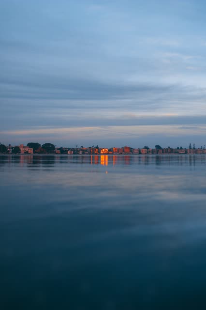 View from the water of the beach, the bay and homes in Mission Bay.