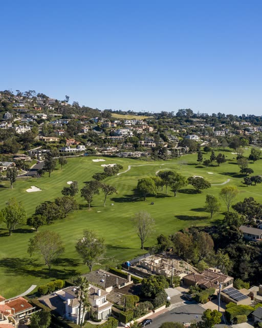 Aerial view of a residential street, homes and the buildings in Downtown San Diego.