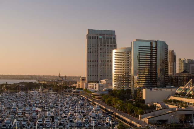Aerial view of the downtown streets, the skyline and boats at Embarcadero.