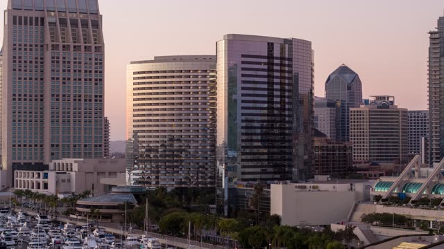 Aerial view of the downtown streets, the skyline and boats at Embarcadero.