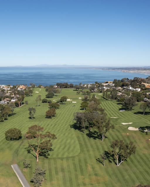 Aerial view of the country inland, the ocean and the bay at La Jolla Country Club.