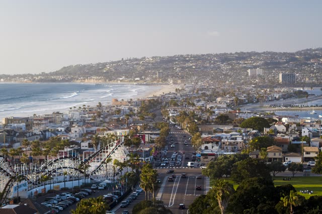 Elevated view of a residential street, the pier and boats in Mission Bay.