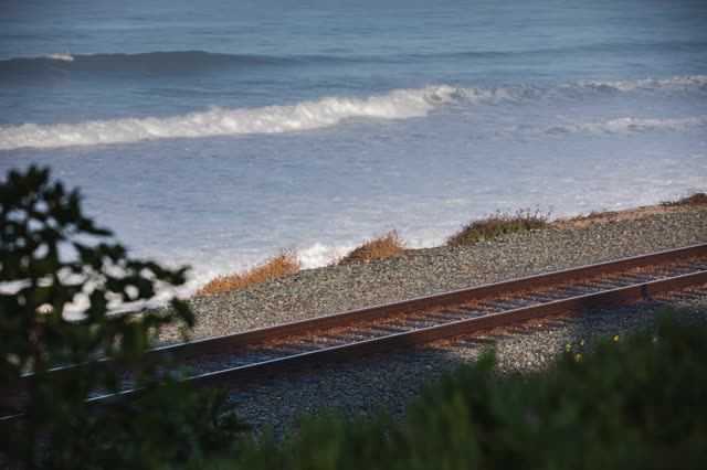 Elevated view of the beach, the surf and the ocean in Del Mar.