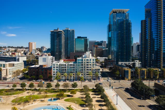 Aerial view of the downtown streets, the skyline and palm trees at Waterfront.