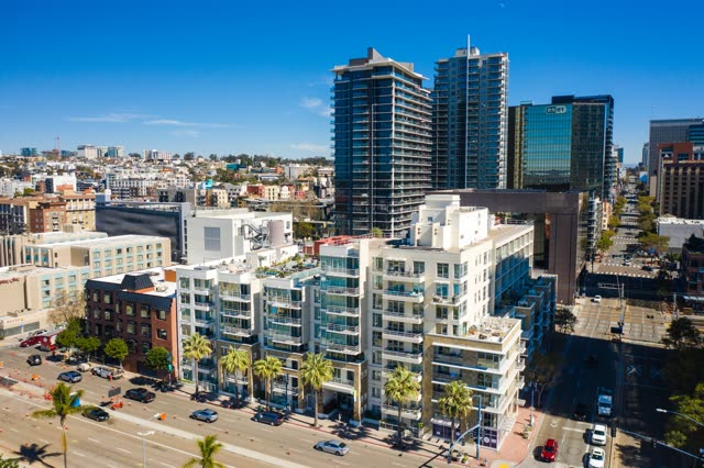 Aerial view of the downtown streets, the skyline and palm trees at Waterfront.