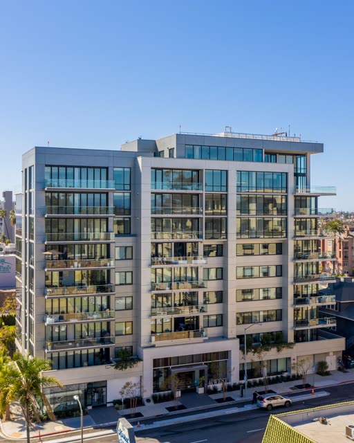 Low aerial view of the downtown streets, palm trees and the buildings at Bankers Hill.