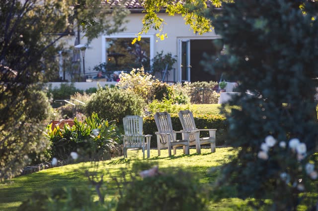 A residential street, homes and the buildings at Covenant.