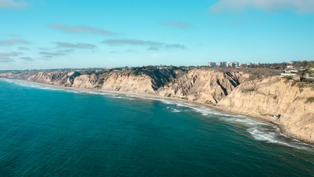 Aerial view of the cliffs, the ocean and homes at La Jolla Farms.