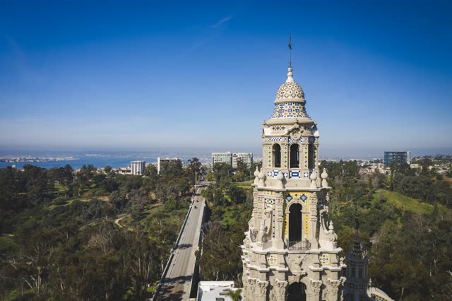 Low aerial view of a park, the bay and the buildings in Balboa Park.