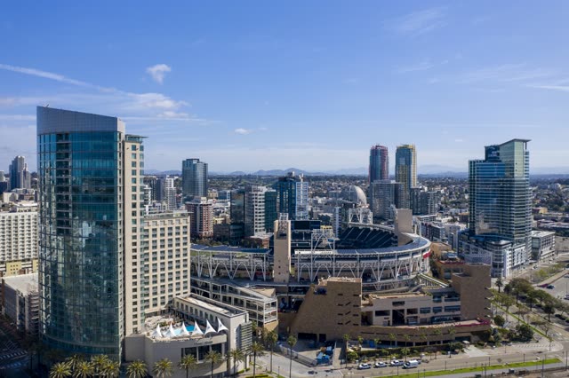 Aerial view of the downtown streets, the skyline and palm trees in Downtown San Diego.