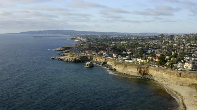 Aerial view of the cliffs, the ocean and homes at Sunset Cliffs.