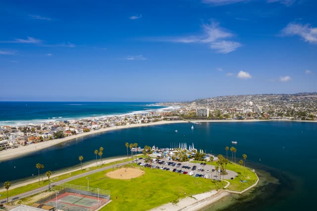 Aerial view of the beach, boats and palm trees in Mission Bay.