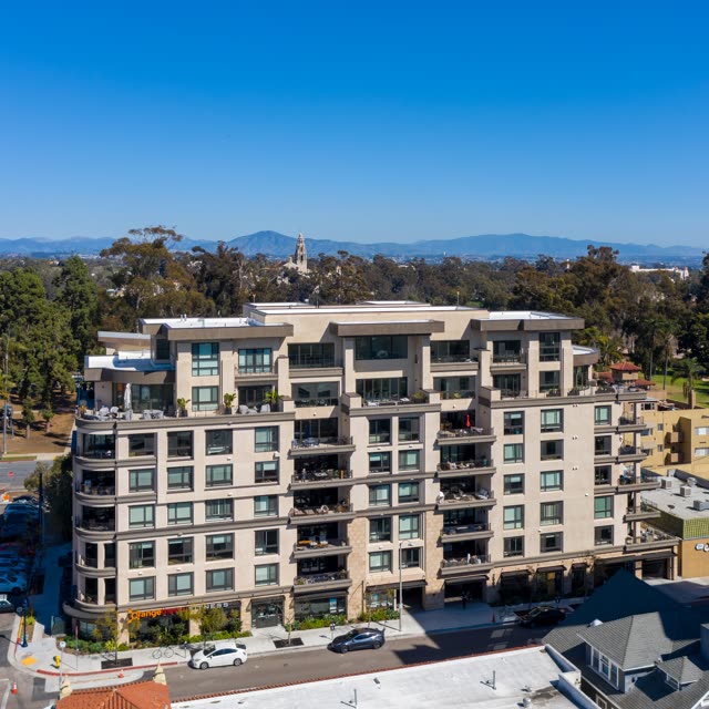 Aerial view of a residential street, homes and the buildings at Bankers Hill.