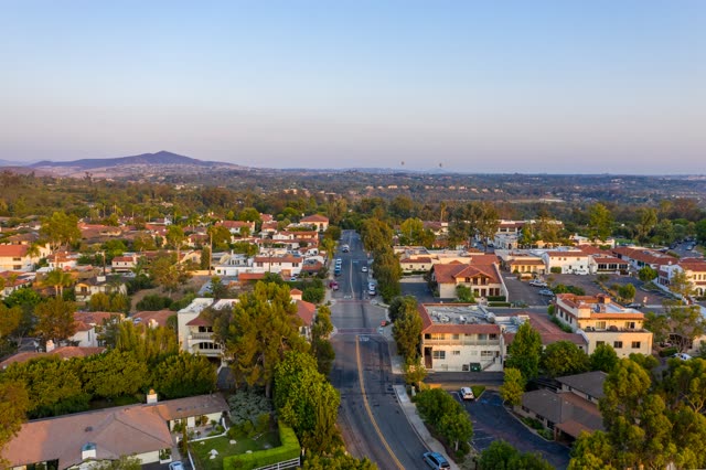 Aerial view of a residential street, homes and the buildings at Covenant.